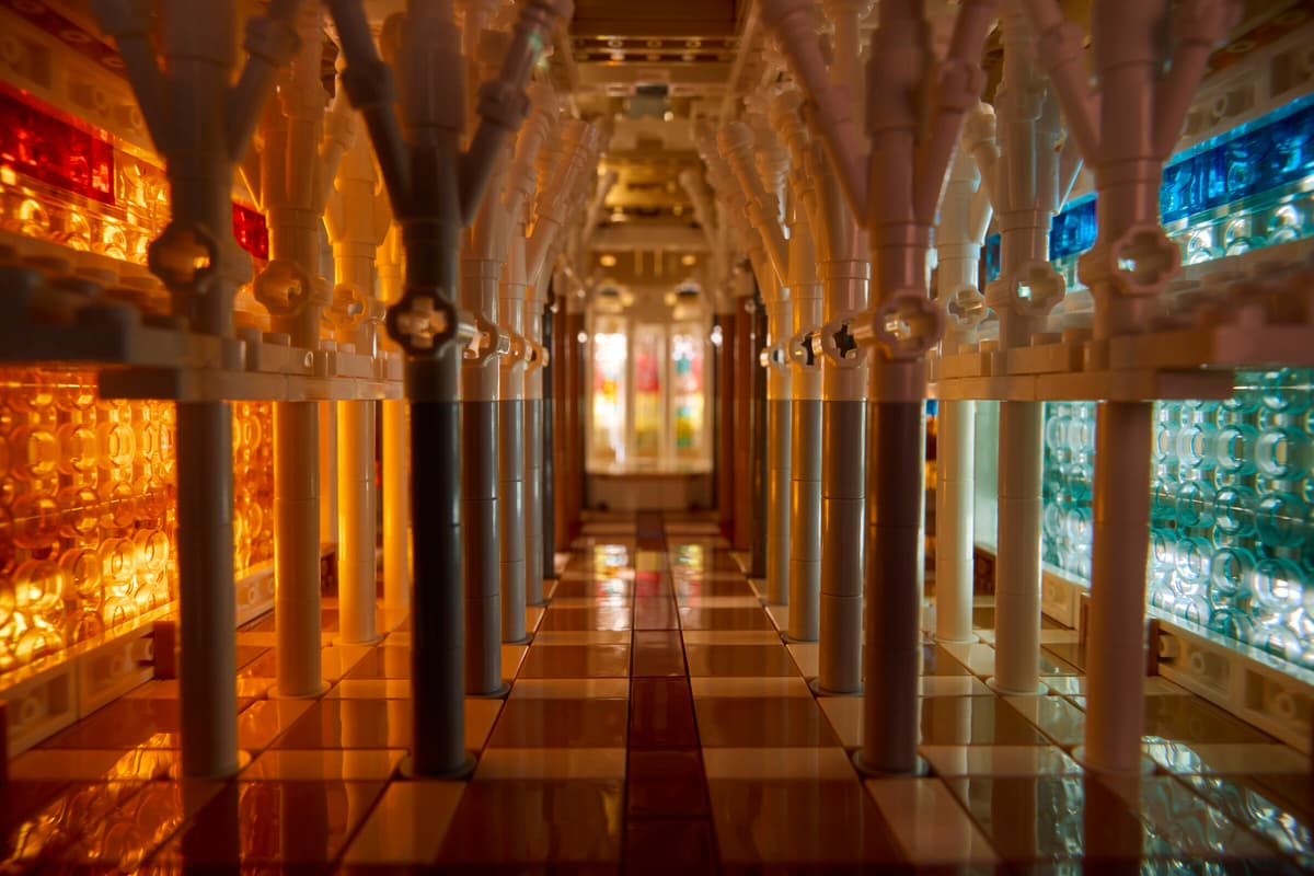 LEGO 21065 interior — nave, columns and lit translucent stained glass
